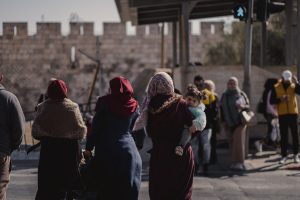 women-holding-child-in-jerusalem
