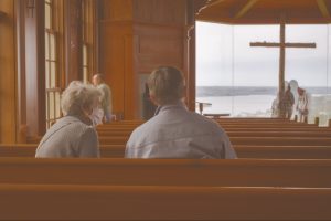 people-sitting-in-pews-at-church