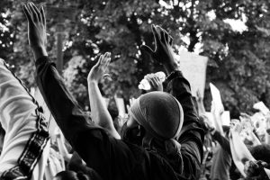 protesters-raising-their-hands
