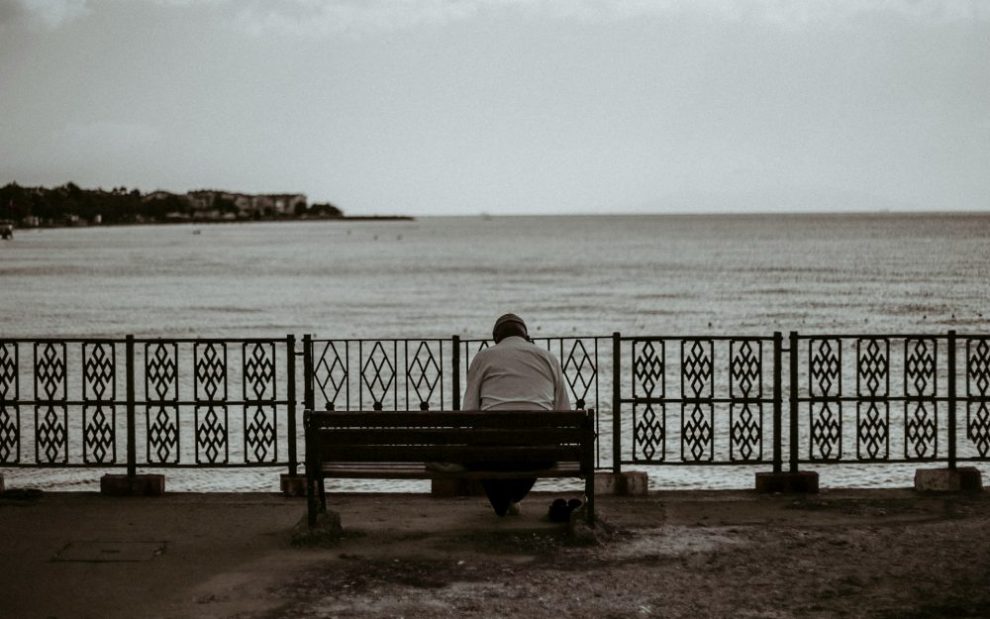 person-sitting-alone-on-bench