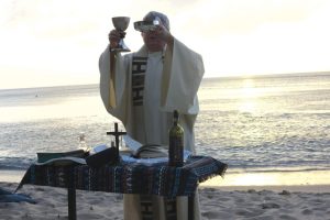 tom-mcgann-celebrates-eucharist-on-beach