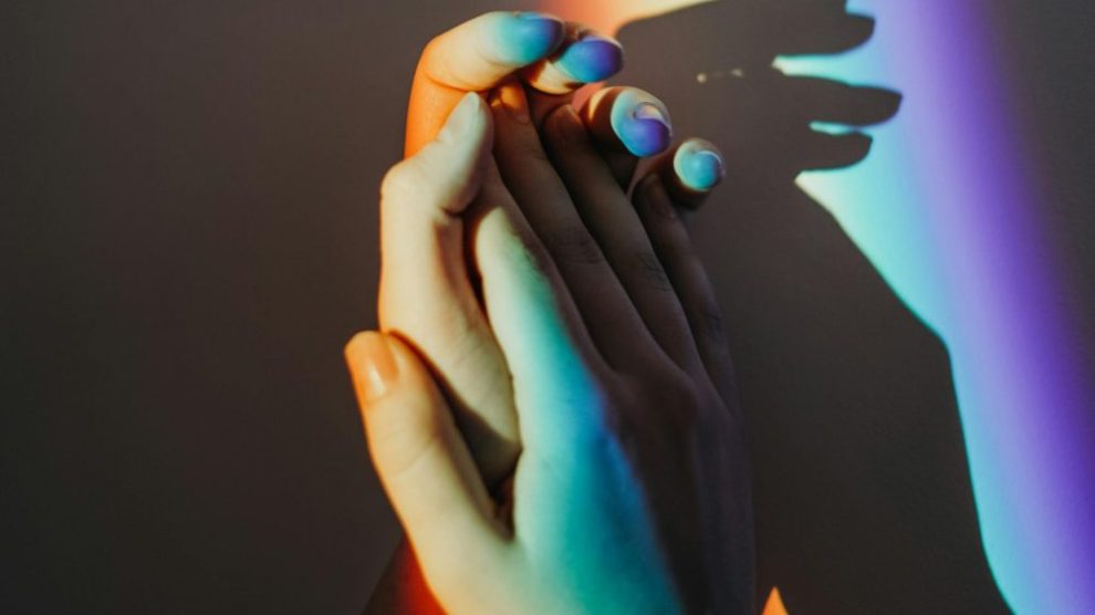hands-in-rainbow-light