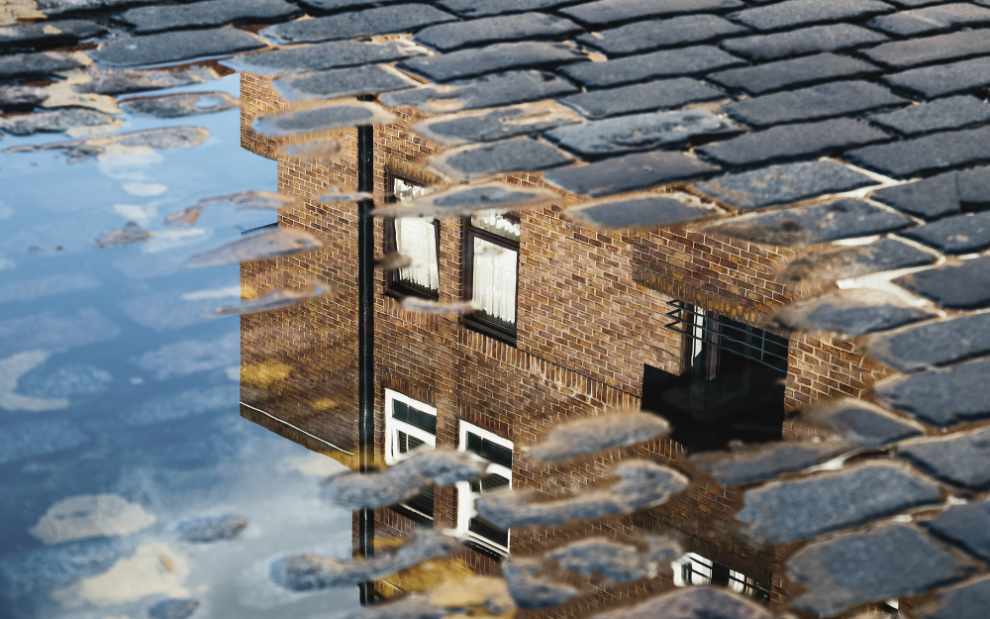 reflection-of-building-in-puddle
