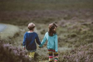 children-walking-in-wilderness