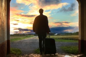 silhouette-person-leaving-with-luggage