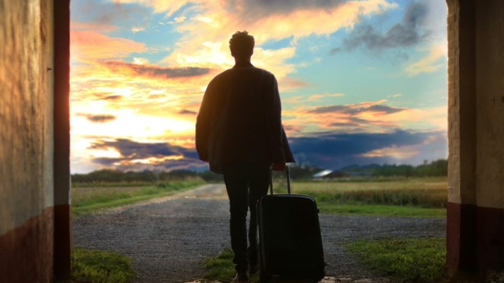 silhouette-person-leaving-with-luggage