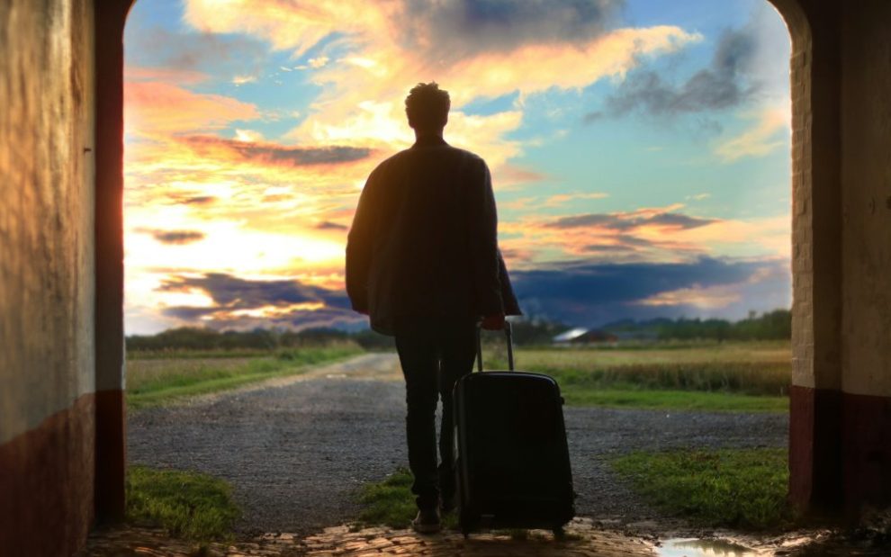 silhouette-person-leaving-with-luggage