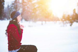 woman-praying-in-snow