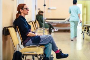 u-s-catholic-woman-waiting-at-hospital