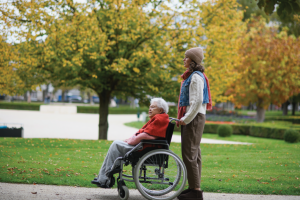 u-s-catholic-person-pushing-wheelchair