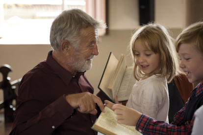 u-s-catholic-older-man-talking-with-children-in-church