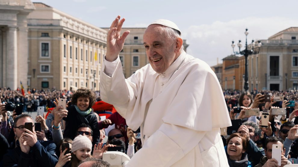 Pope Francis waves at crowds - U.S. Catholic
