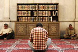 u-s-catholic-men-reading-the-quran