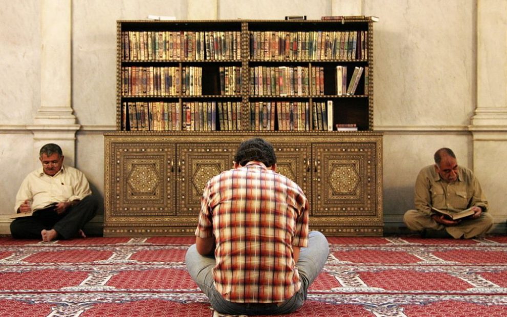 u-s-catholic-men-reading-the-quran