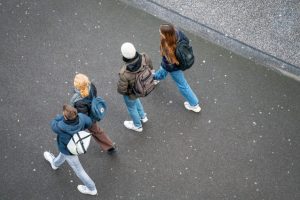 u-s-catholic-young-adults-walking-down-street