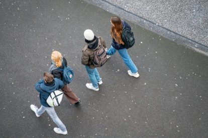 u-s-catholic-young-adults-walking-down-street