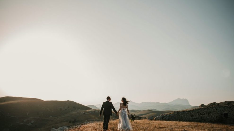 u-s-catholic-married-couple-in-distance