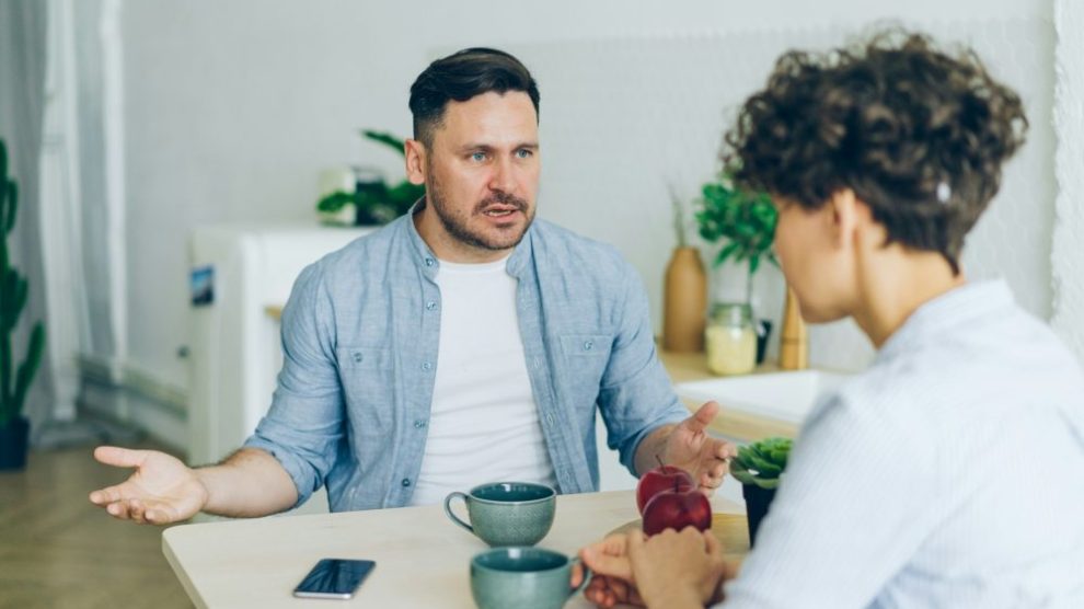 u-s-catholic-annoyed-man-at-table