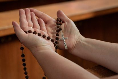u-s-catholic-person-holding-rosary