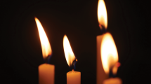 u-s-catholic-candles-in-darkness