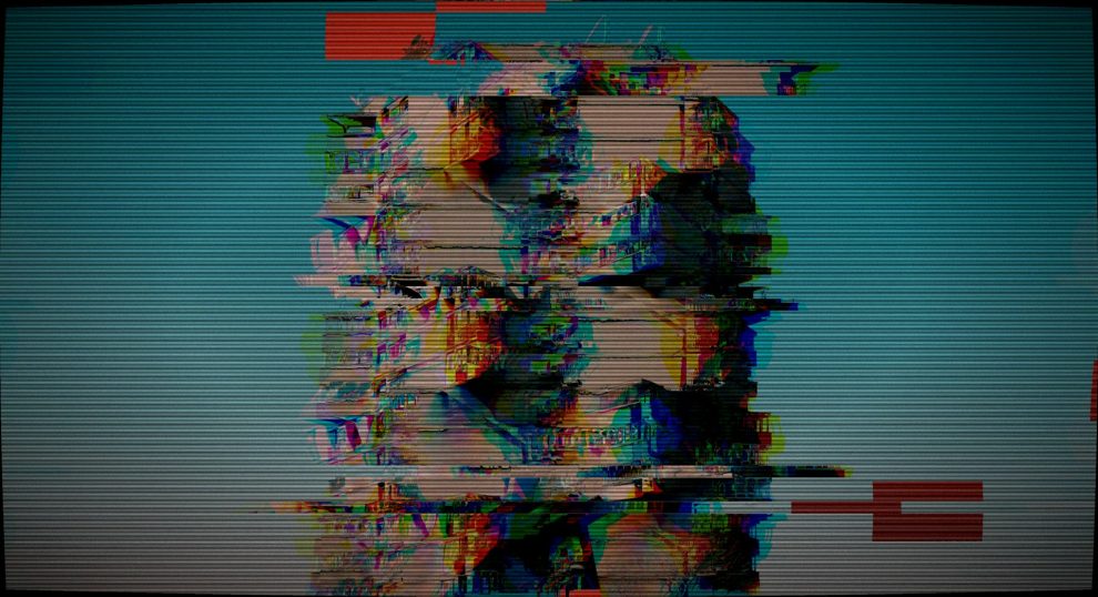 Distorted heads on a glitchy television screen