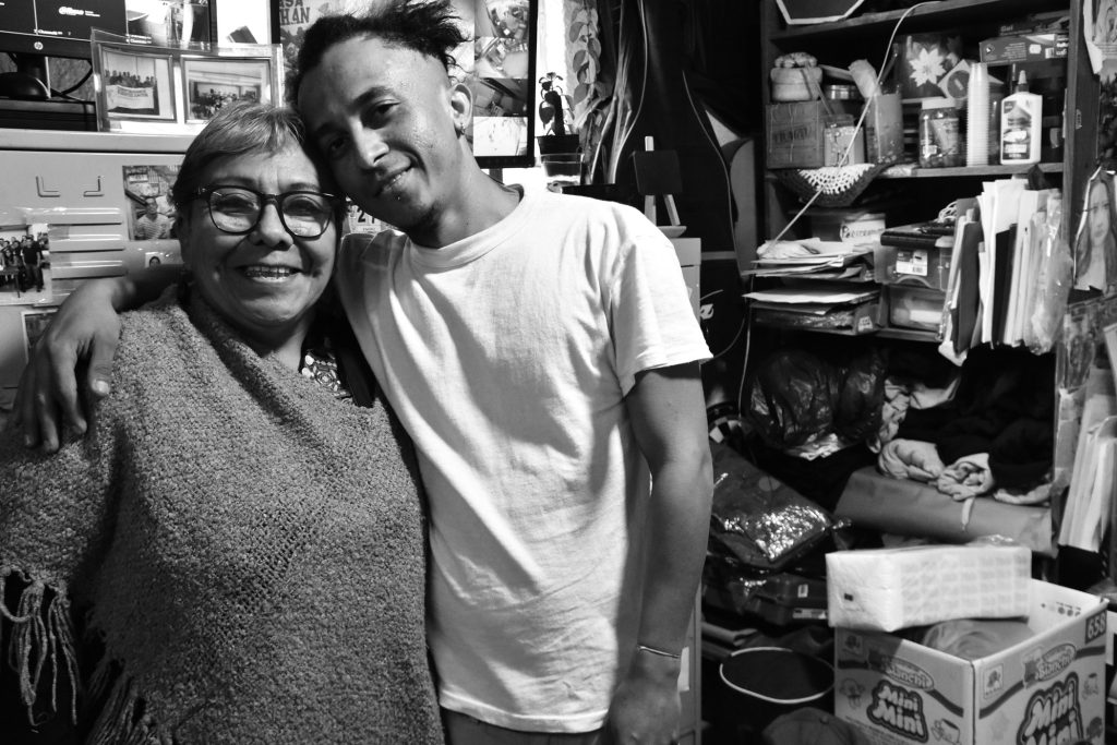 Leonel Palacios with Gabriela Hernández, the founder and director of Casa Tochán, which provides housing, health care, and job training to migrants in Mexico City.