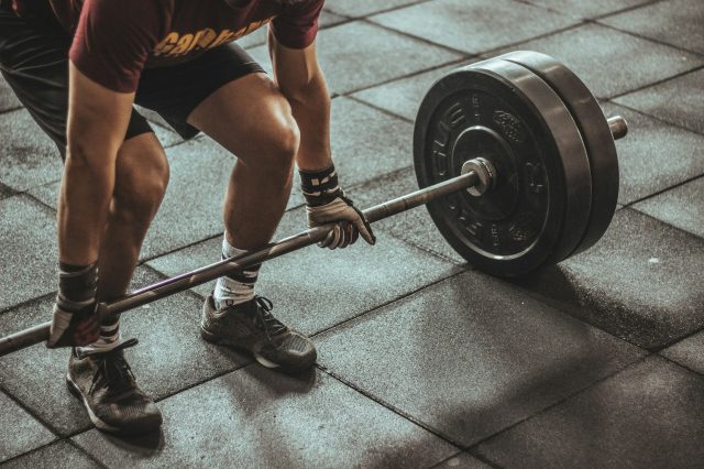 Person lifting a barbell