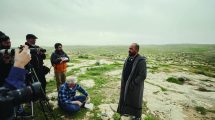 Palestinian filmmaker Hamdan Ballal, codirector of the documentary No Other Land, talks to the media about Israeli settler attacks on his village of Susya in Masafer Yatta. Mosab Shawer/MEI/MEI/SIPA/Newscom