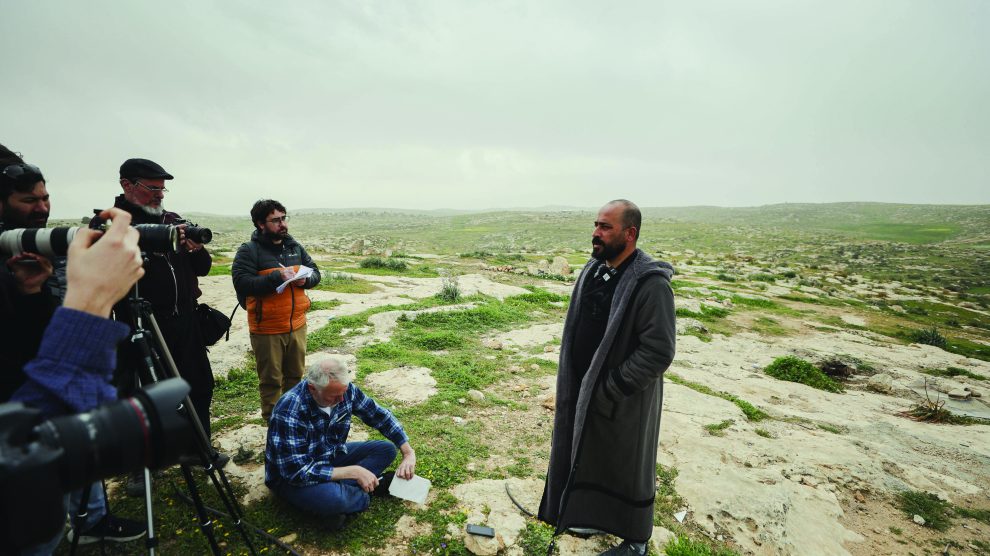 Palestinian filmmaker Hamdan Ballal, codirector of the documentary No Other Land, talks to the media about Israeli settler attacks on his village of Susya in Masafer Yatta. Mosab Shawer/MEI/MEI/SIPA/Newscom