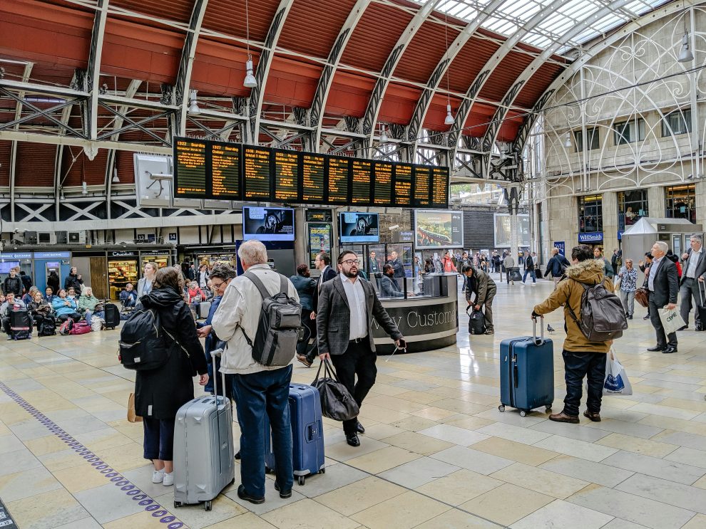 Travelers gathered in airport terminal