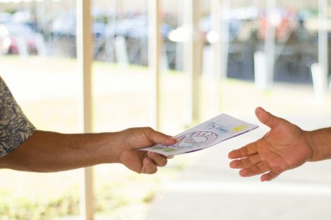 Person handing out fliers