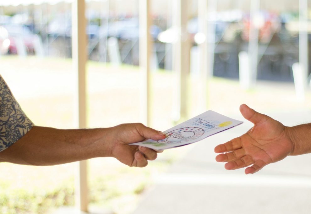 Person handing out fliers