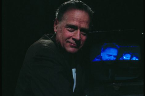 Marshall McLuhan with a television set