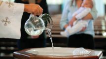 Godparents at a baptism