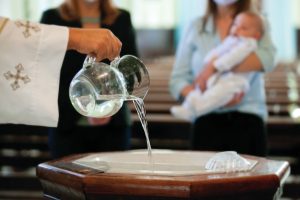 Godparents at a baptism