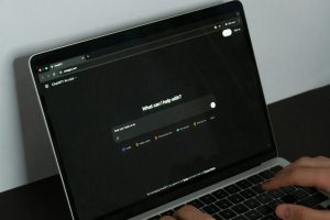 Laptop showing AI chatbot prompt