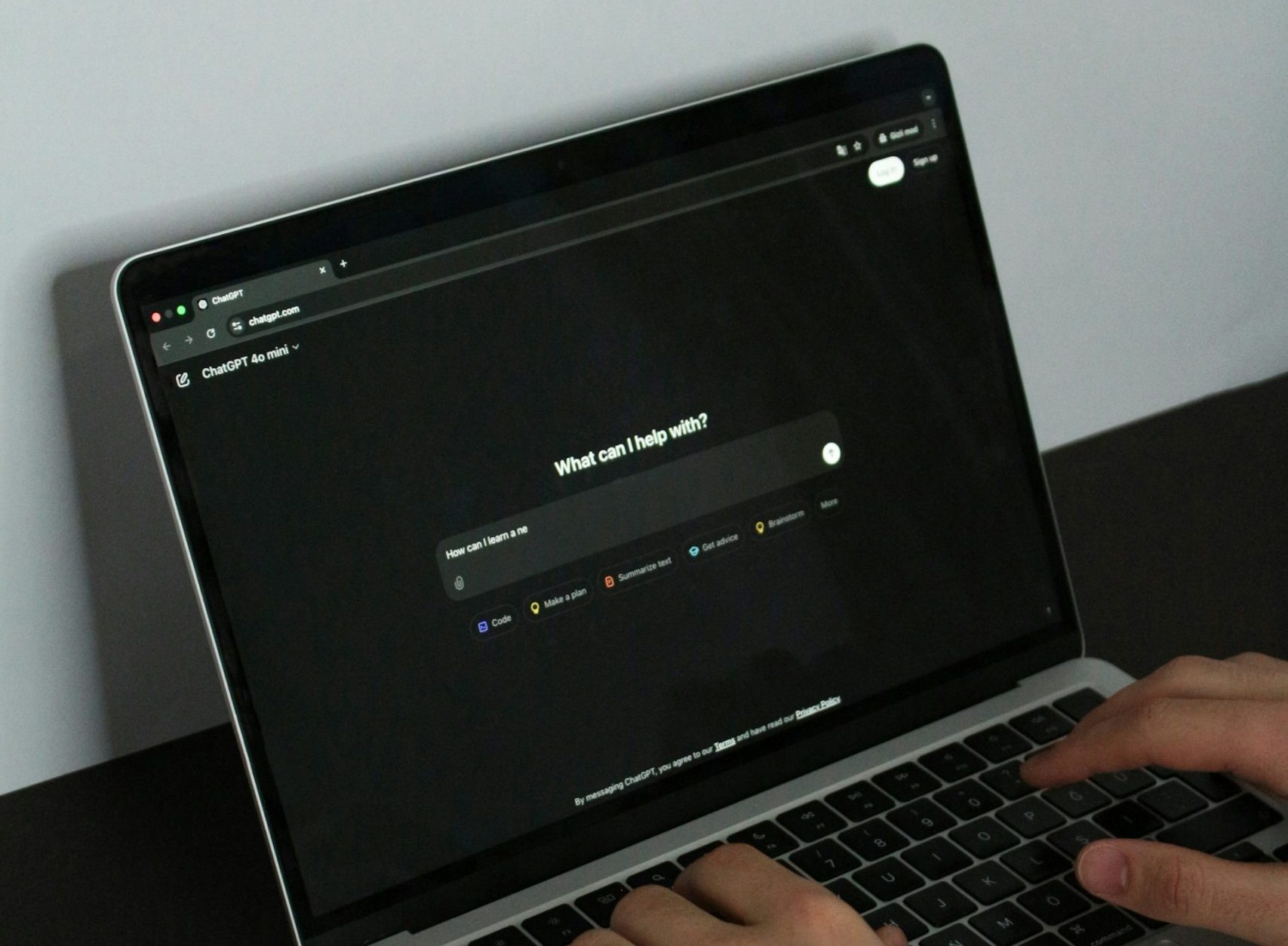 Laptop showing AI chatbot prompt