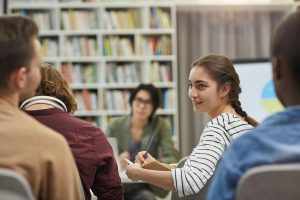 People talking in a classroom