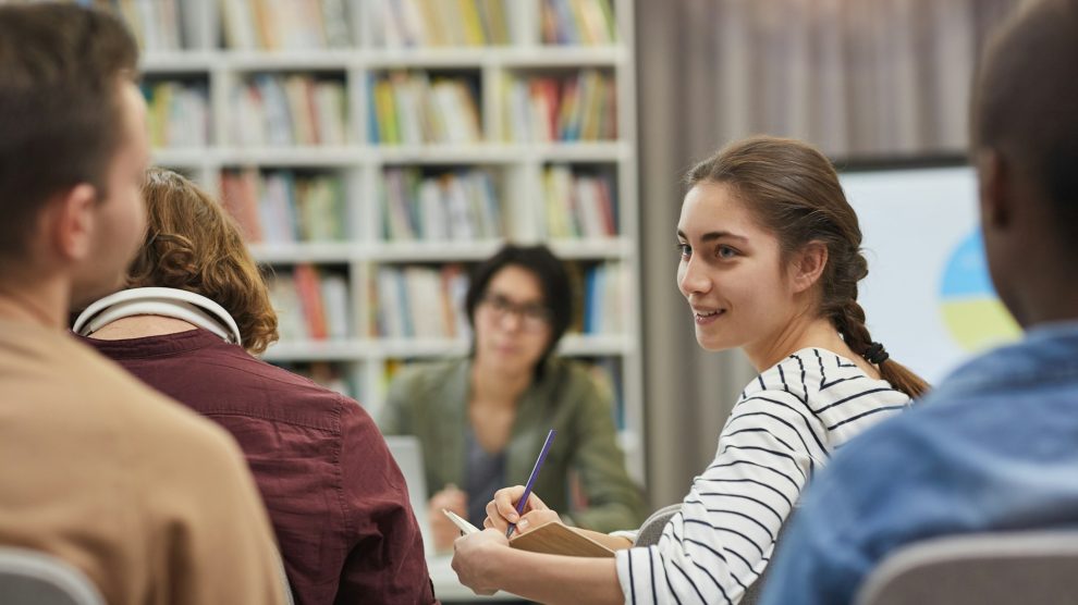 People talking in a classroom