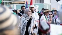 woman speaking at pro-Palestine protest