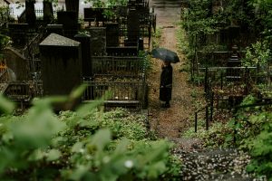 Person standing in a cemetery