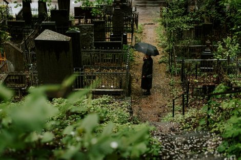 Person standing in a cemetery