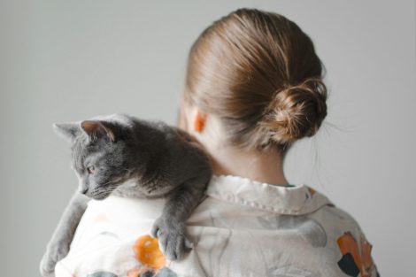 woman holding a cat