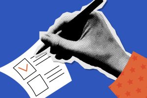 Hand checking a box on a ballot
