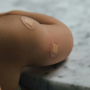 u-s-catholic-child-with-bandages-from-vaccination
