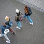 u-s-catholic-young-adults-walking-down-street