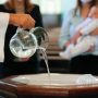 Godparents at a baptism