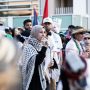 woman speaking at pro-Palestine protest