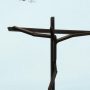 Minimalist sculpture of a crucifix
