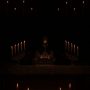 a-host-ina-monstrance-lit-by-candles